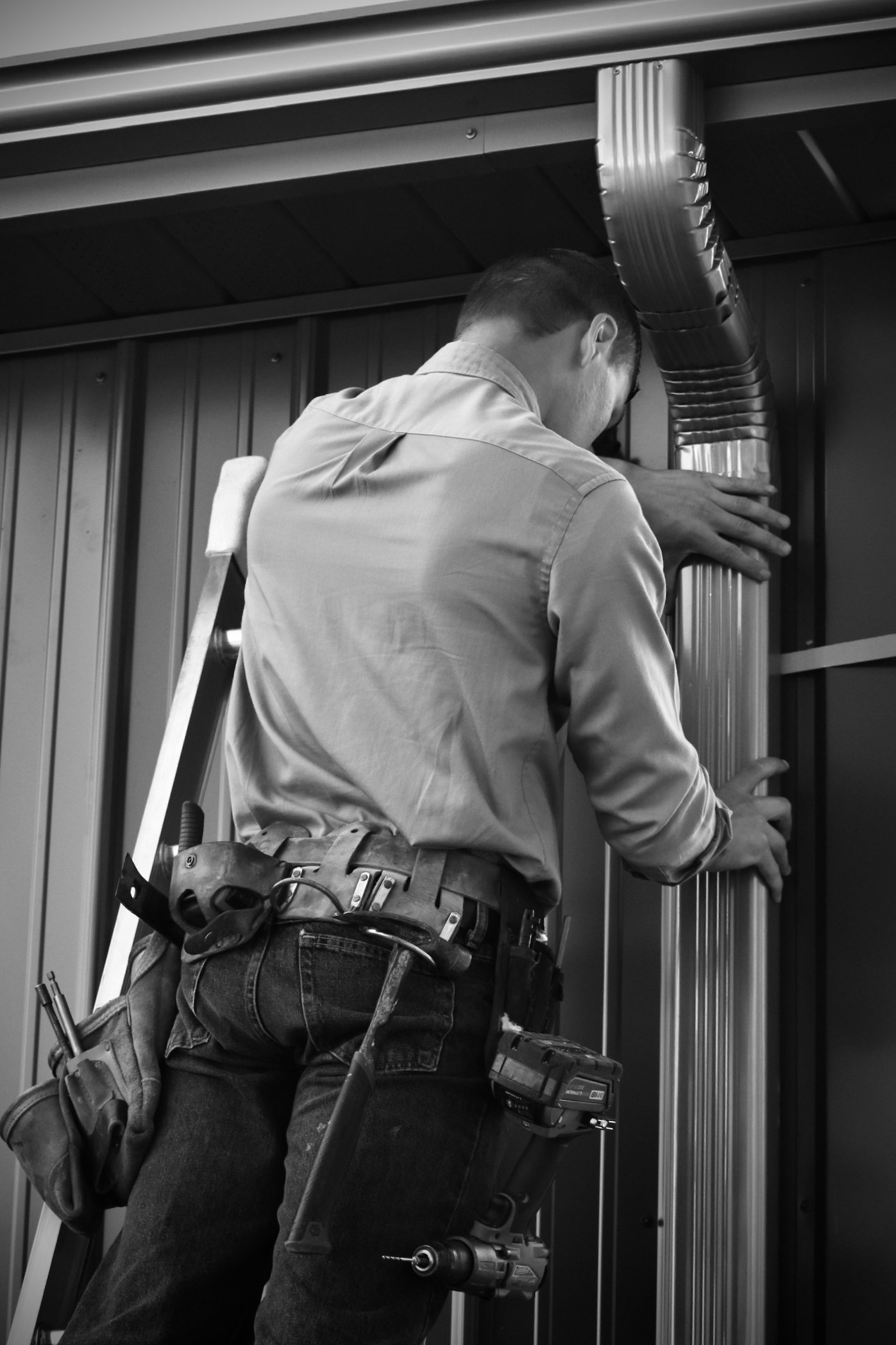 Wyold Gutters crew member working on a gutter project