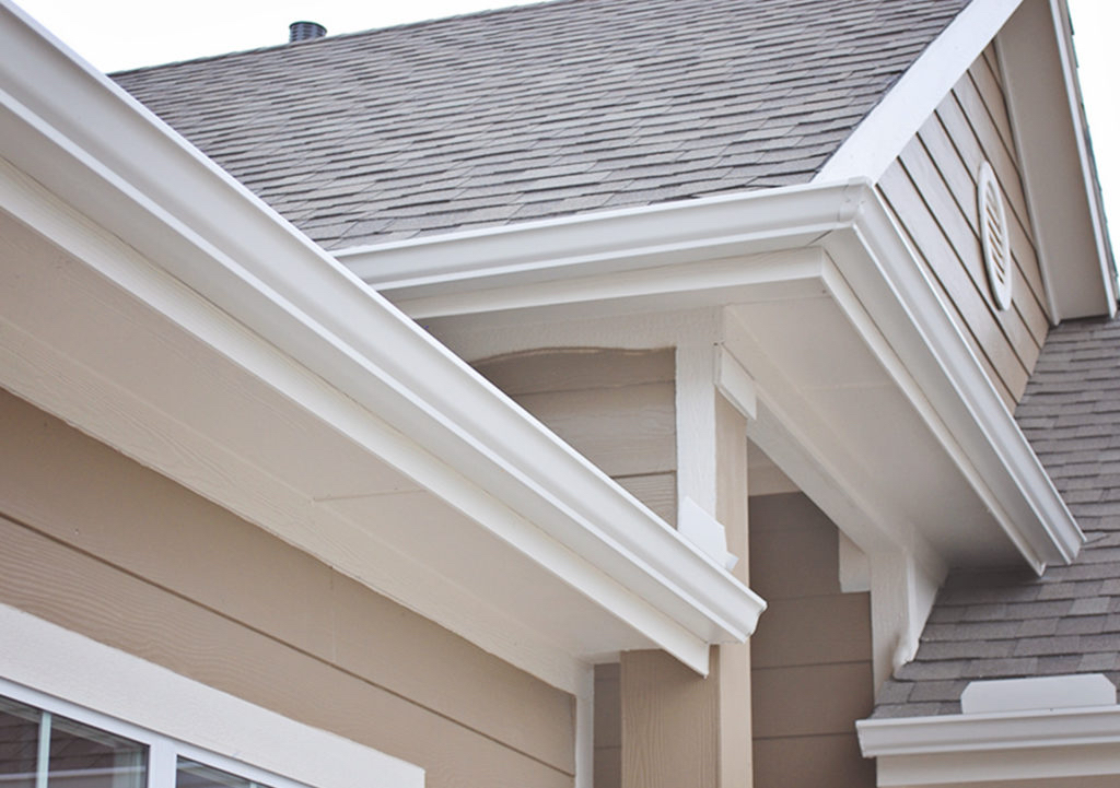 Fresh seamless gutter installation on a Wyoming home